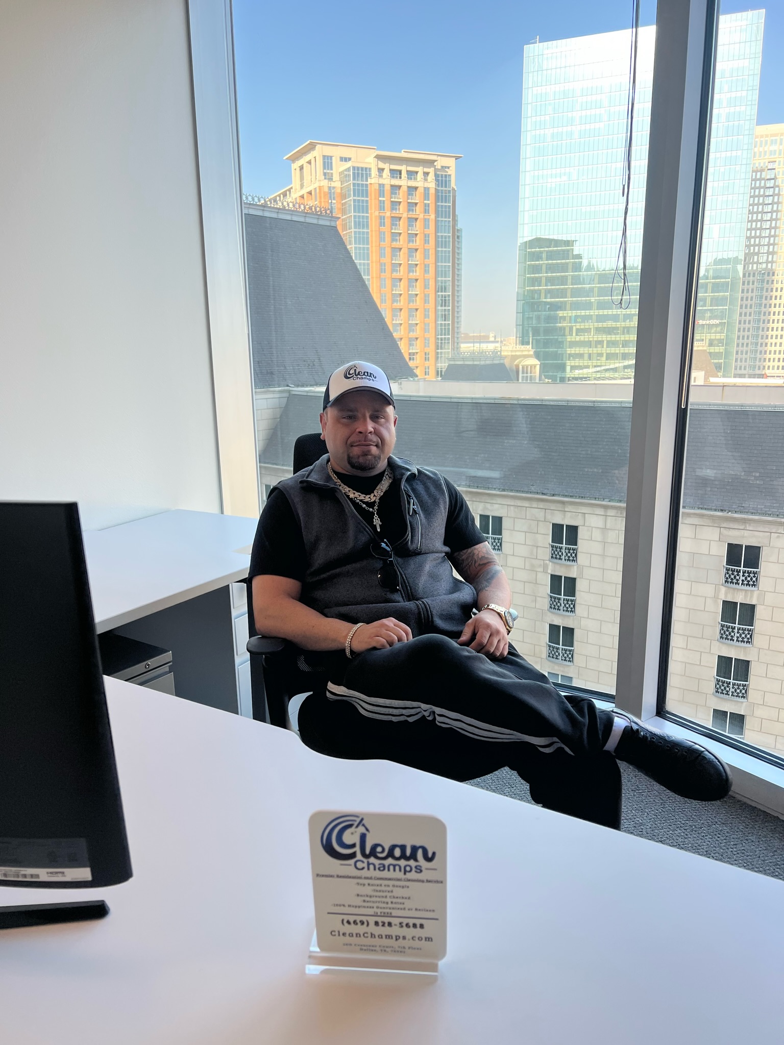 Cody Melton at his desk in his Dallas office